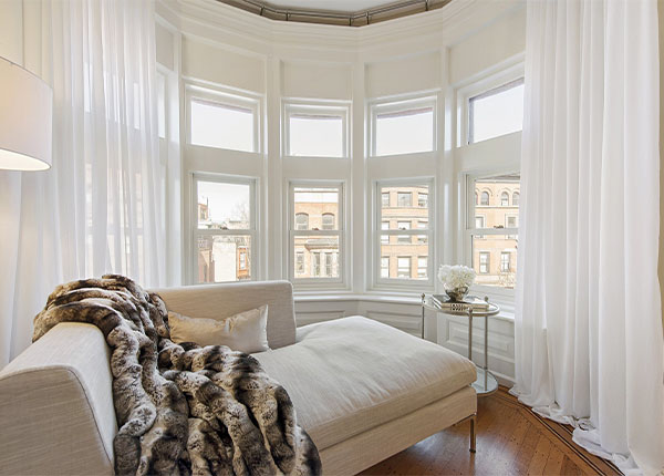 Остекление эркерными окнами квартиры в Лобне